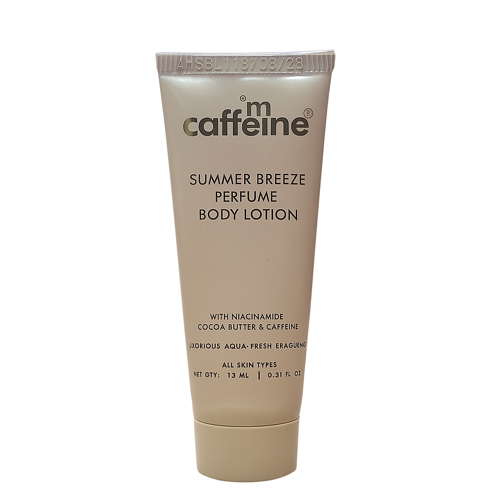 mCaffeine Summer Breeze Perfume Lotion 15 ml - niacinamide, cocoa butter and caffeine - travel size tube standing on white