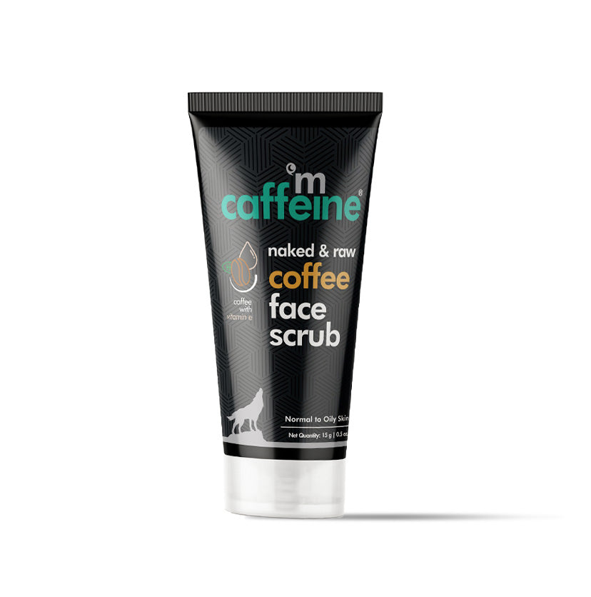 mCaffeine Coffee Face Scrub 15g - caffeine, walnut and vitamin E - travel size black tube standing on white