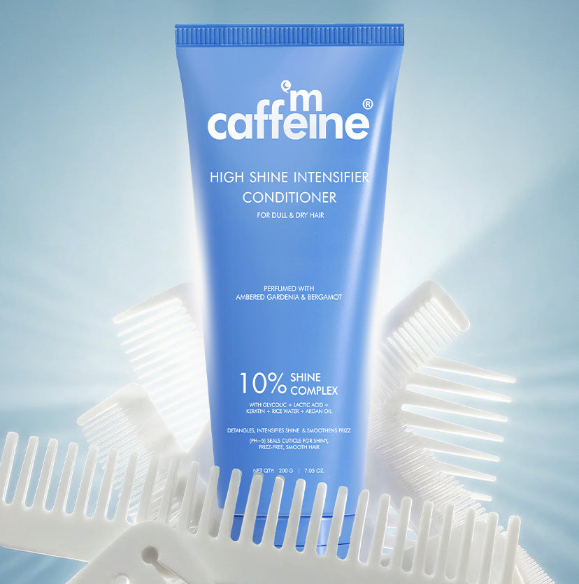 mCaffeine High Shine Intensifier Glossy Hair Conditioner 10% Shine Complex - AHA complex, rice water and keratin - blue tube among white combs