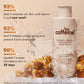 mCaffeine Caramel Crunch Exfoliating Body Wash 300 ml - consumer study figures beside the bottle in a water splash with caramel popcorn