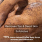 mCaffeine Coffee Body Scrub 100 g - coffee with coconut oil - close-up of the grainy scrub massaged across a shoulder and back