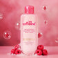 mCaffeine Brightening Raspberry Rush Body Wash 300ml - coffee extract and 5% glycerin - bottle with raspberries on a pink backdrop
