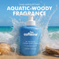 mCaffeine By the Blues Perfume Body Lotion 300 ml - aquatic woody fragrance visual with the bottle in a breaking wave