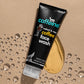 mCaffeine Coffee Face Wash 100 ml - caffeine, white water lily and aloe vera - tube on tan backdrop with water droplets and golden gel swatch